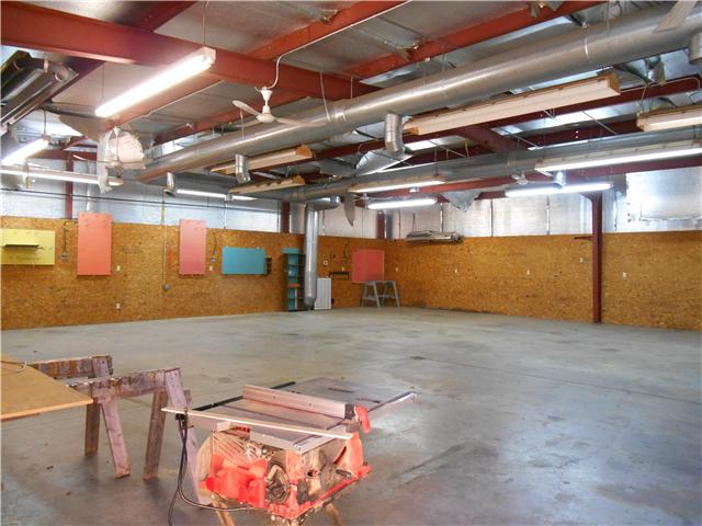 121 Sam Davis Drive Springfield, TN 37172 - Photo 13 of 20 NOTICE THE EXCEPTIONALLY HIGH CEILINGS AND THE ELABORATE HEATING IN THE CEILING AREA OF THIS BUILDING.