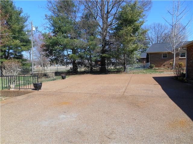 121 Sam Davis Drive Springfield, TN 37172 - Photo 19 of 20 THE BACK PATIO OF THIS HOME IS LARGE IN GREAT CONDITION AND PERFECT SETTING FOR FAMILY FUN OR JUST RELAXING. THIS PROPERTY HOST 2 LOTS AND GIVES YOU SO MUCH FOR YOUR MONEY.