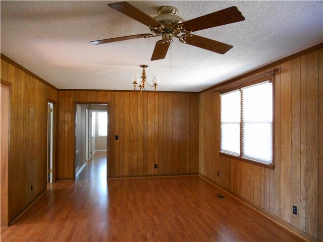 121 Sam Davis Drive Springfield, TN 37172 - Photo 4 of 20 DEN OR FAMILY ROOM IS DECKED OUT IN LOVELY WARM PANELING. IF YOU DON'T PERFER THE WOOD LOOK, PAINTED PANELING IS LOVELY AND ENDURING.