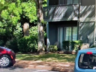 21 Vaughns Gap Road, Unit 143 Nashville, TN 37205 - Photo 2 of 6 a view of a house with a car parked