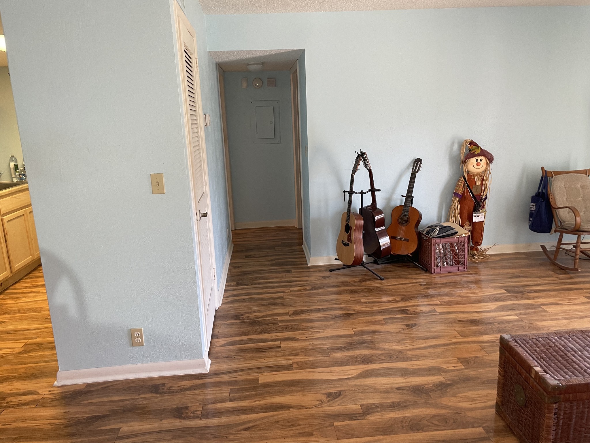 21 Vaughns Gap Road, Unit 143 Nashville, TN 37205 - Photo 3 of 6 a view of a room with wooden floor and gym equipment