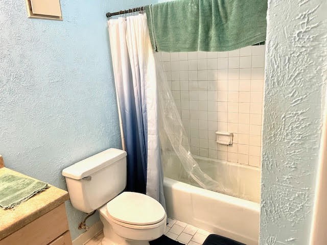 21 Vaughns Gap Road, Unit 143 Nashville, TN 37205 - Photo 5 of 6 a white toilet sitting next to a bath tub and a shower