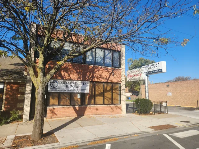 a view of a building with a tree