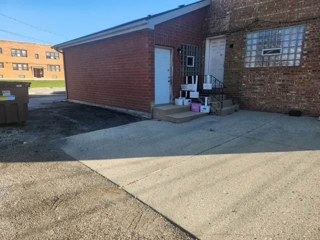 a view of a building with patio