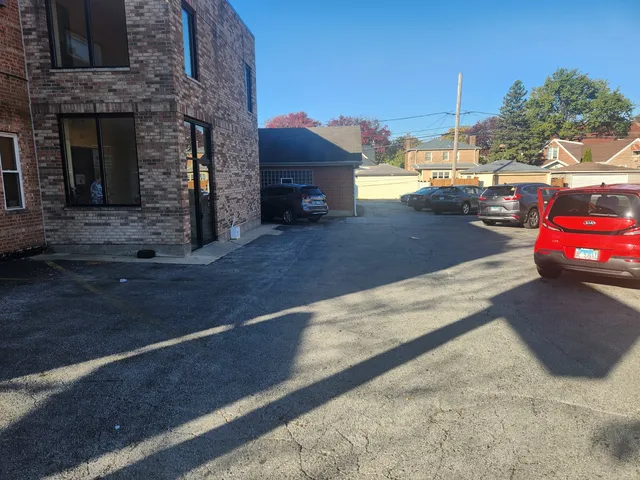 a view of a street with cars