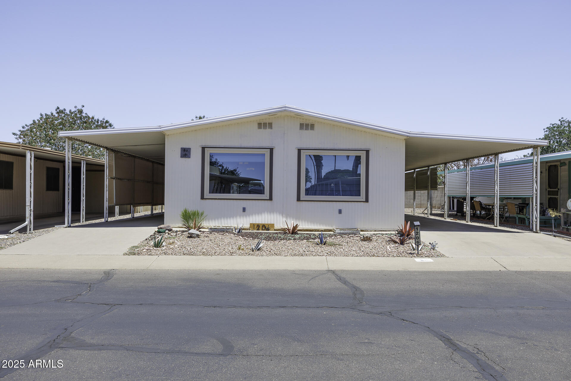 a view of a flesh screen tv on the side of the road