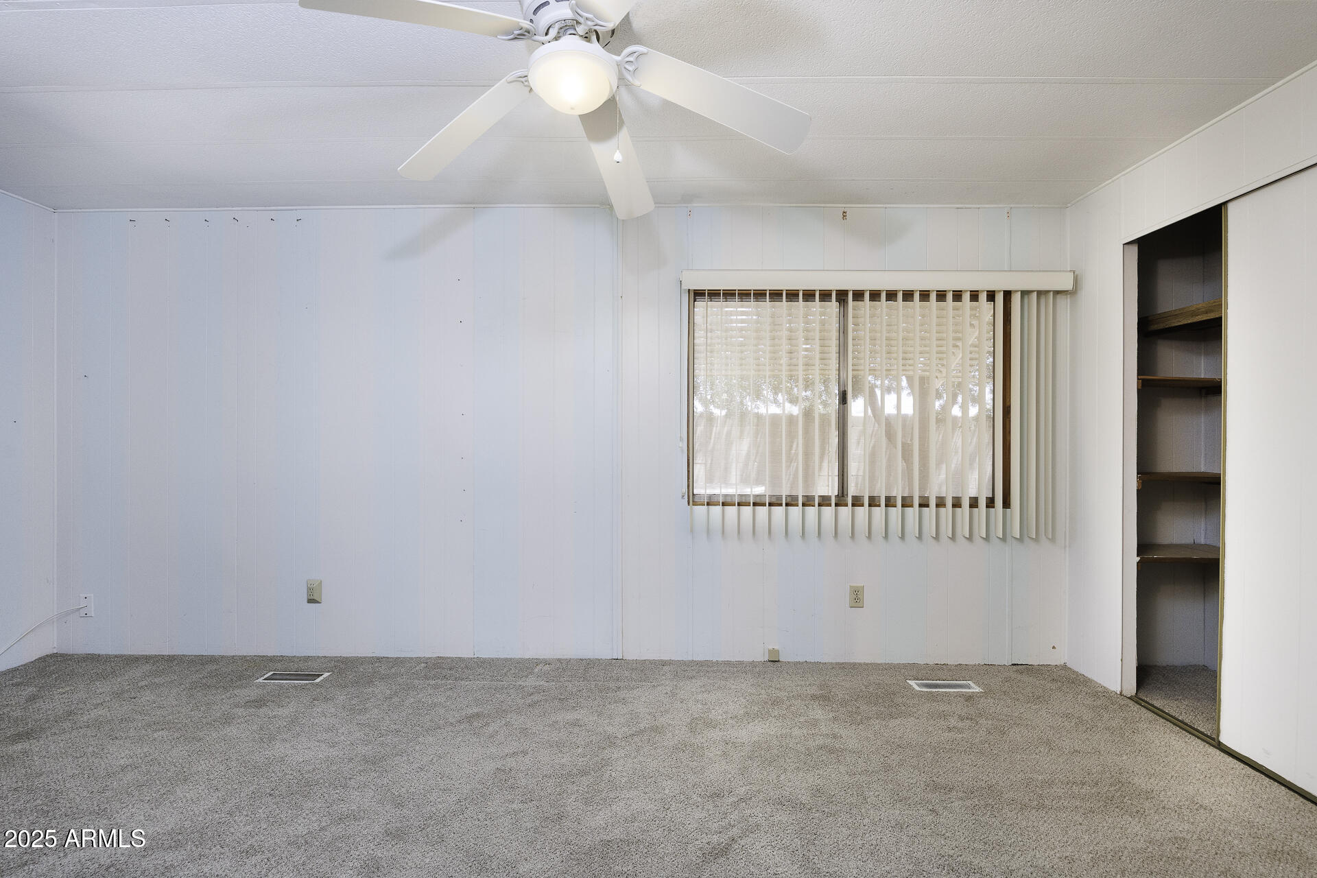 2100 North Trekell Road, Unit 20 Casa Grande, AZ 85122 - Photo 12 of 40 an empty room with windows and closet