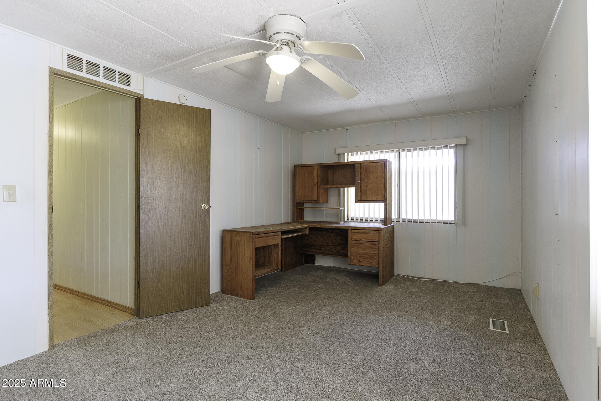 2100 North Trekell Road, Unit 20 Casa Grande, AZ 85122 - Photo 13 of 40 a view of room with furniture and a window
