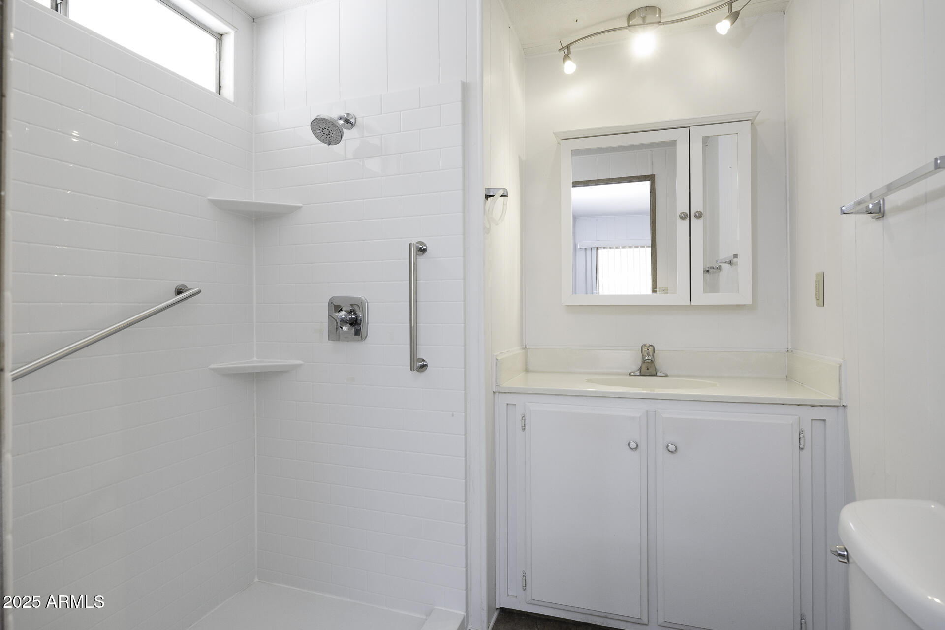 2100 North Trekell Road, Unit 20 Casa Grande, AZ 85122 - Photo 15 of 40 a bathroom with a shower sink and mirror