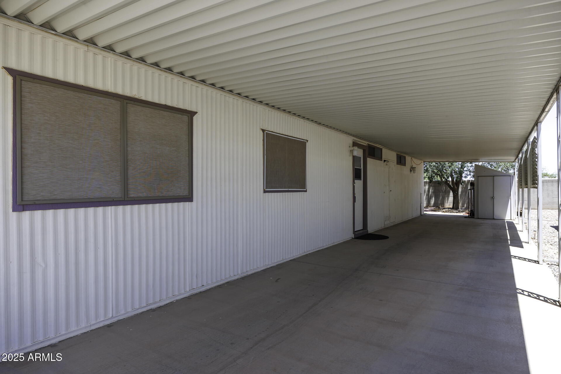 2100 North Trekell Road, Unit 20 Casa Grande, AZ 85122 - Photo 25 of 40 a view of a car garage