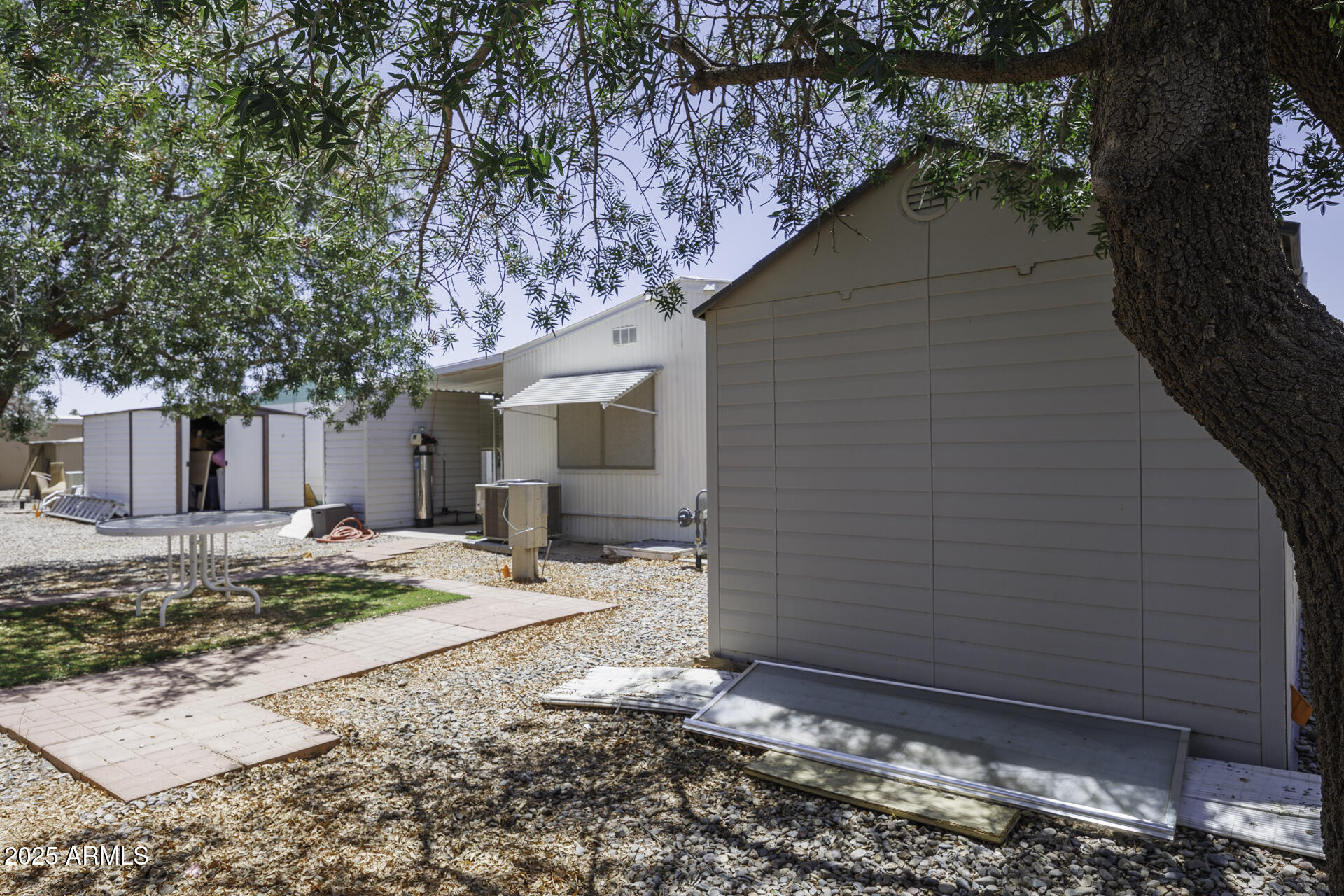 2100 North Trekell Road, Unit 20 Casa Grande, AZ 85122 - Photo 27 of 40 a backyard of a house with seating space