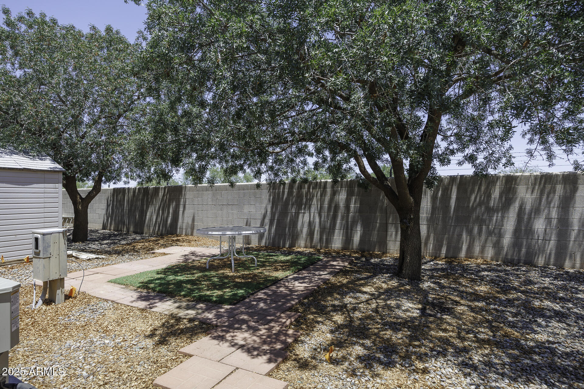 2100 North Trekell Road, Unit 20 Casa Grande, AZ 85122 - Photo 29 of 40 a view of backyard with tree