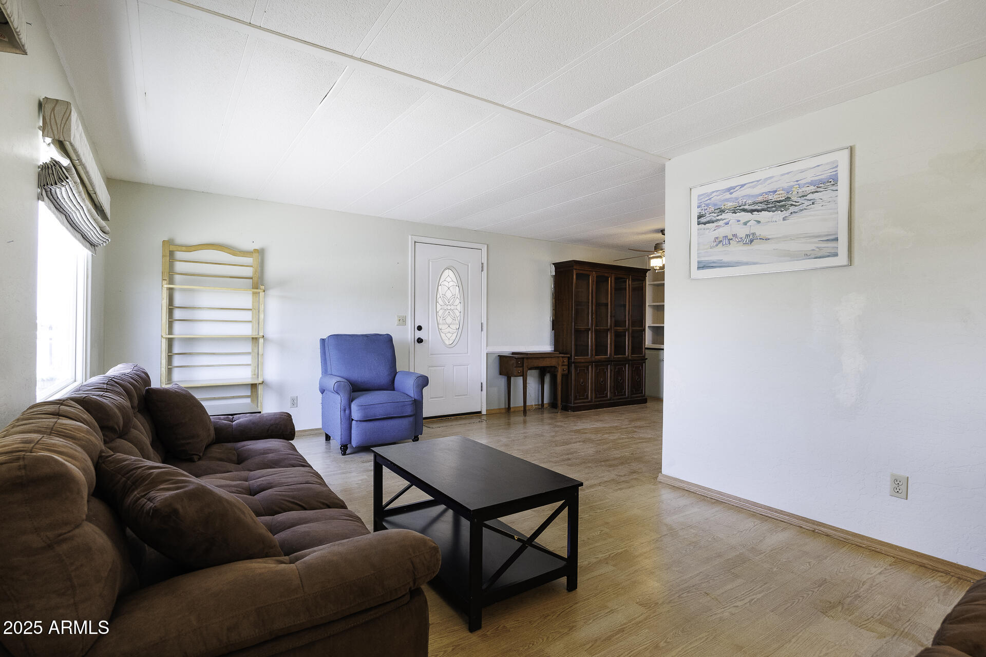 2100 North Trekell Road, Unit 20 Casa Grande, AZ 85122 - Photo 4 of 40 a living room with furniture and a window