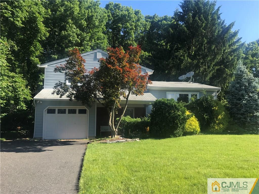 26 Francis Road East Brunswick, NJ 08816 - Photo 2 of 23 front view of a house with a yard