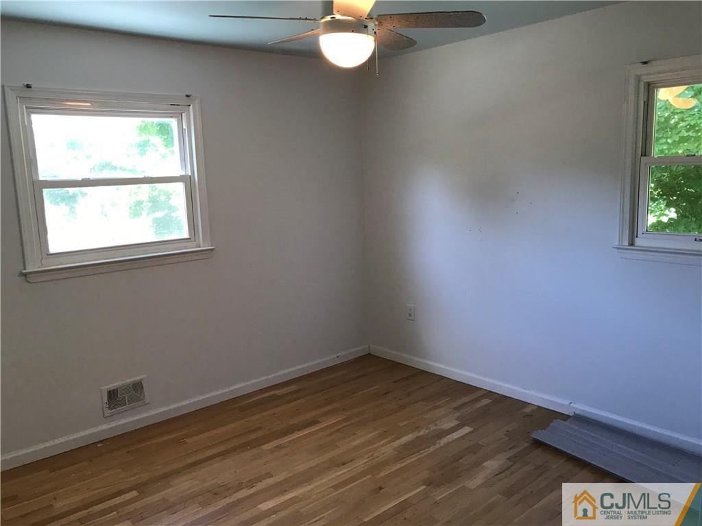 26 Francis Road East Brunswick, NJ 08816 - Photo 15 of 23 an empty room with a window