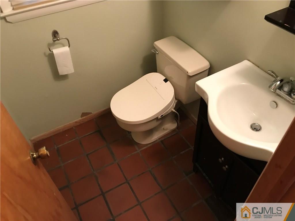 26 Francis Road East Brunswick, NJ 08816 - Photo 19 of 23 a bathroom with a toilet and a sink