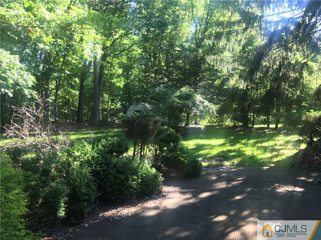 26 Francis Road East Brunswick, NJ 08816 - Photo 20 of 23 a backyard of a house with lots of green space