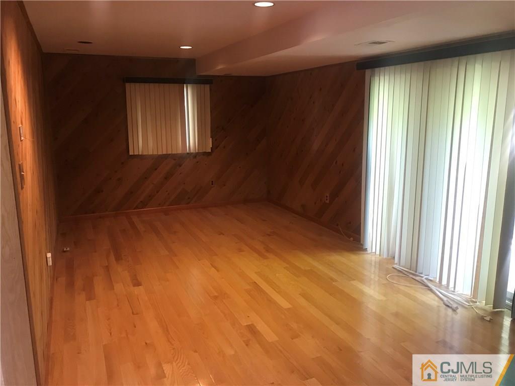 26 Francis Road East Brunswick, NJ 08816 - Photo 5 of 23 an empty room with windows