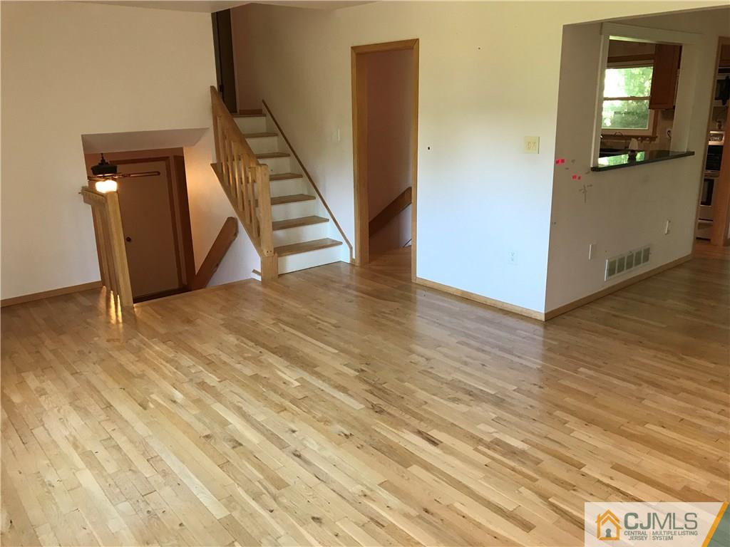 26 Francis Road East Brunswick, NJ 08816 - Photo 6 of 23 a view of an entryway with wooden floor