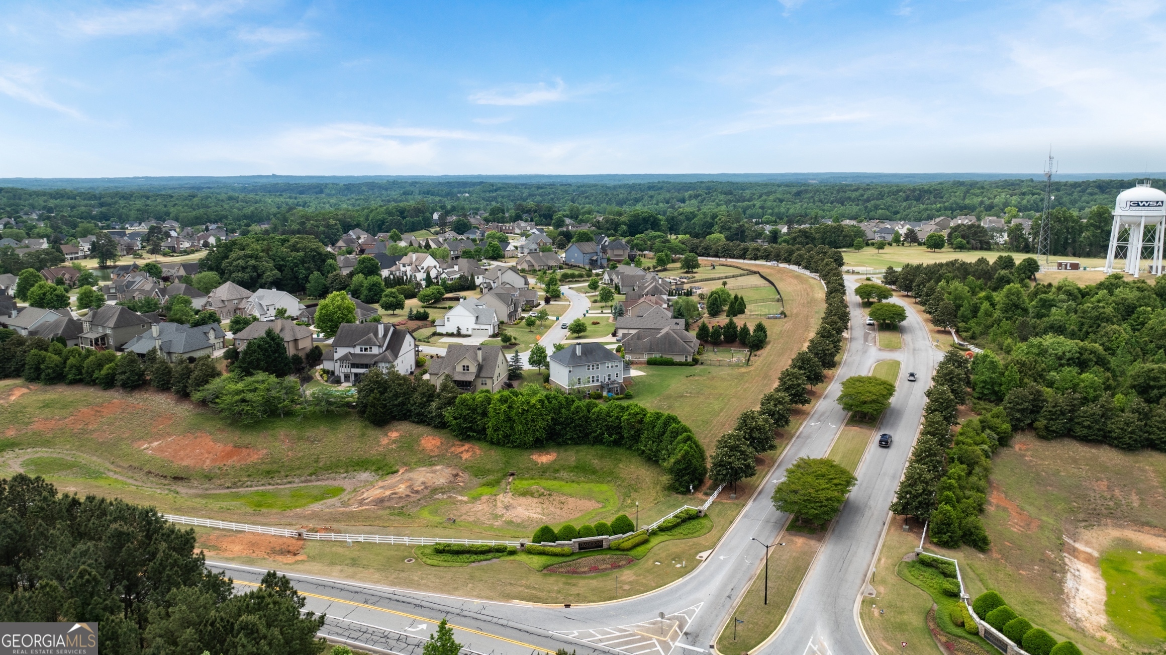 15 Overview Court Hoschton, GA 30548 - Photo 40 of 43 an aerial view of residential houses with outdoor space and trees