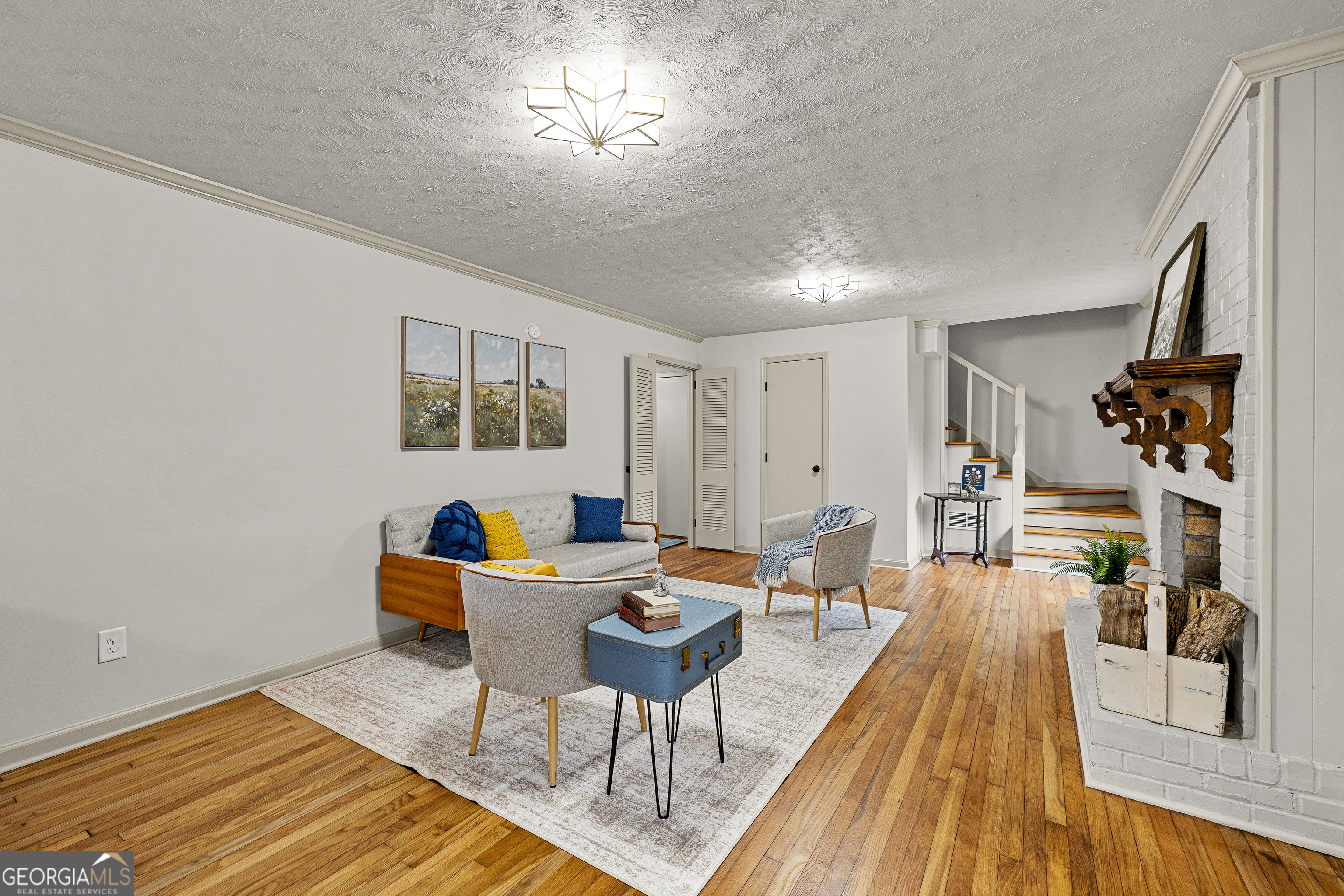 617 Mayes Way Manchester, GA 31816 - Photo 15 of 34 a living room with furniture and a wooden floor