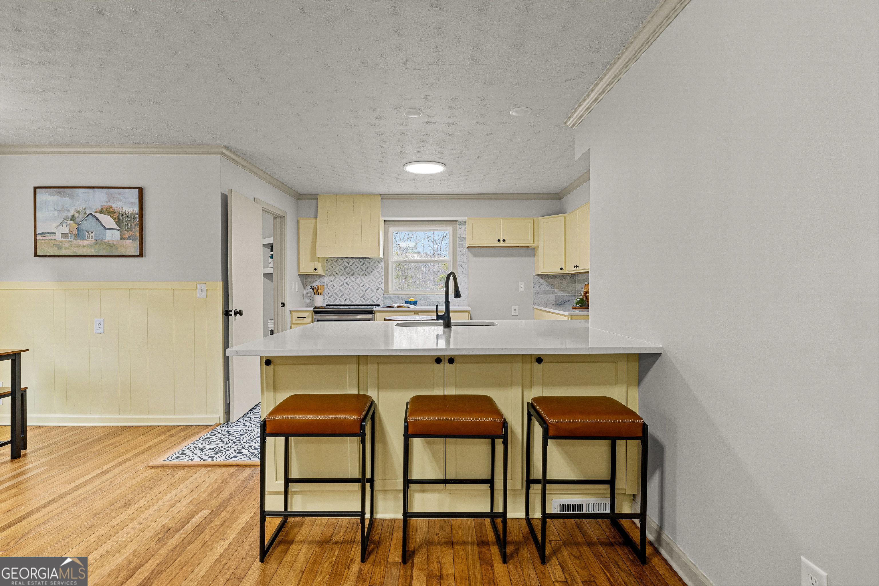 617 Mayes Way Manchester, GA 31816 - Photo 16 of 34 a kitchen with a table and chairs in it