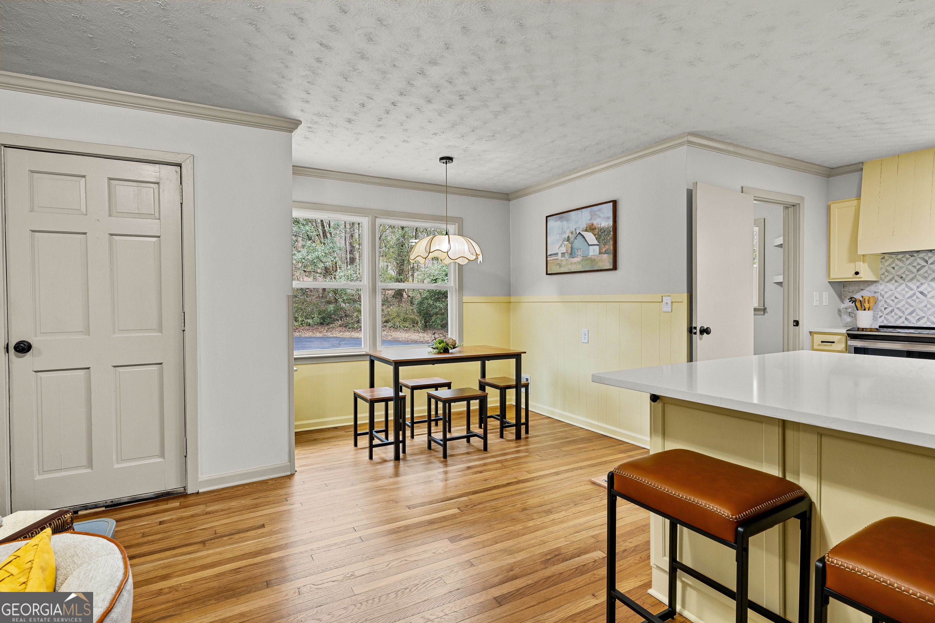 617 Mayes Way Manchester, GA 31816 - Photo 17 of 34 a view of a workspace with furniture and wooden floor
