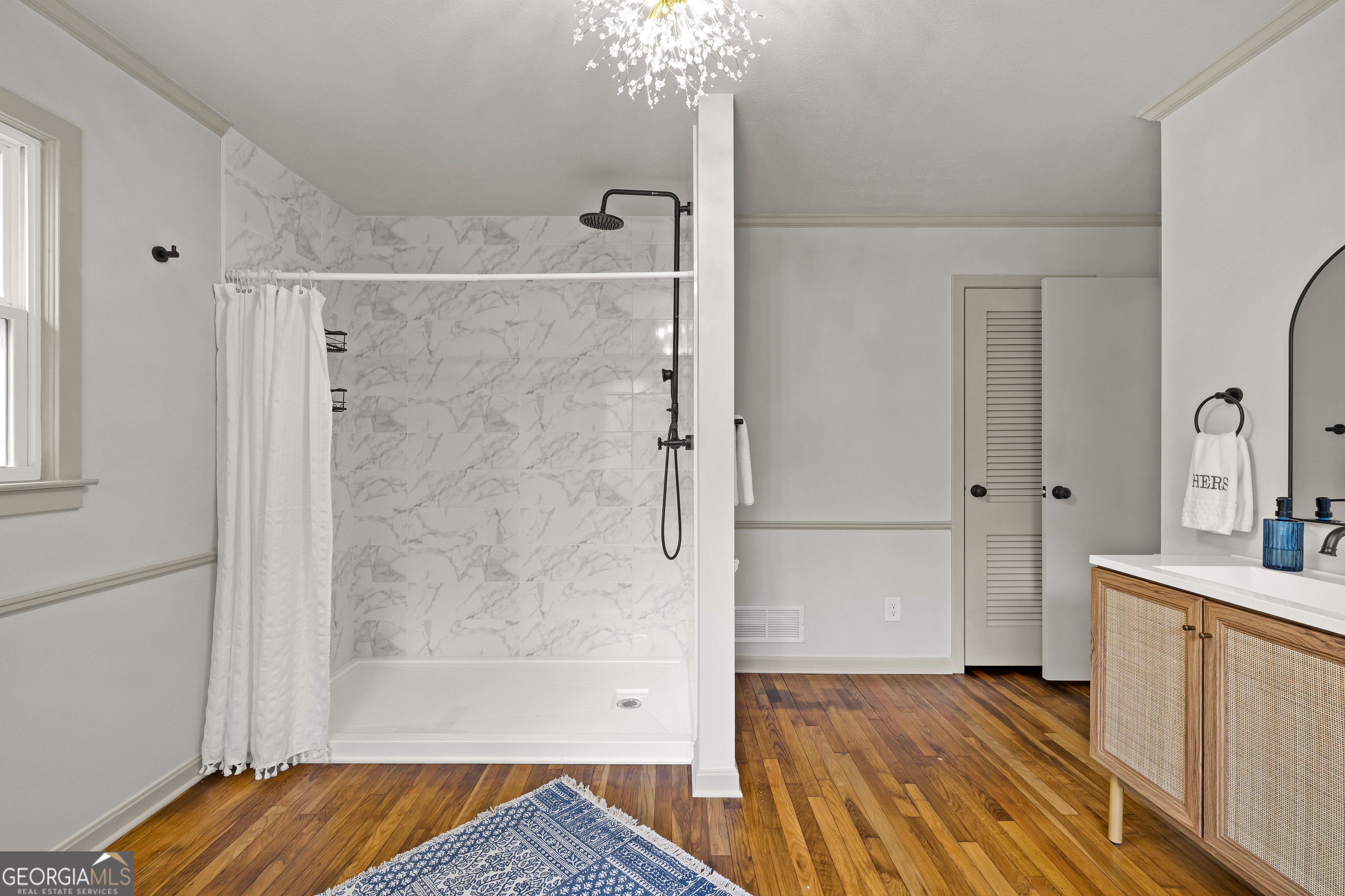 617 Mayes Way Manchester, GA 31816 - Photo 24 of 34 a bathroom with a sink and shower
