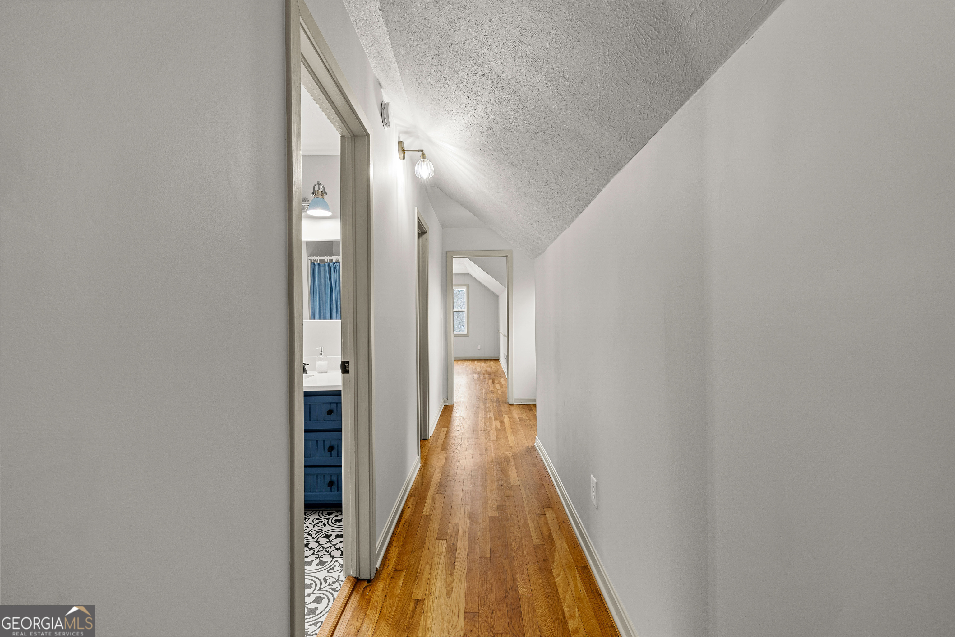 617 Mayes Way Manchester, GA 31816 - Photo 27 of 34 a view of a hallway with wooden floor and staircase