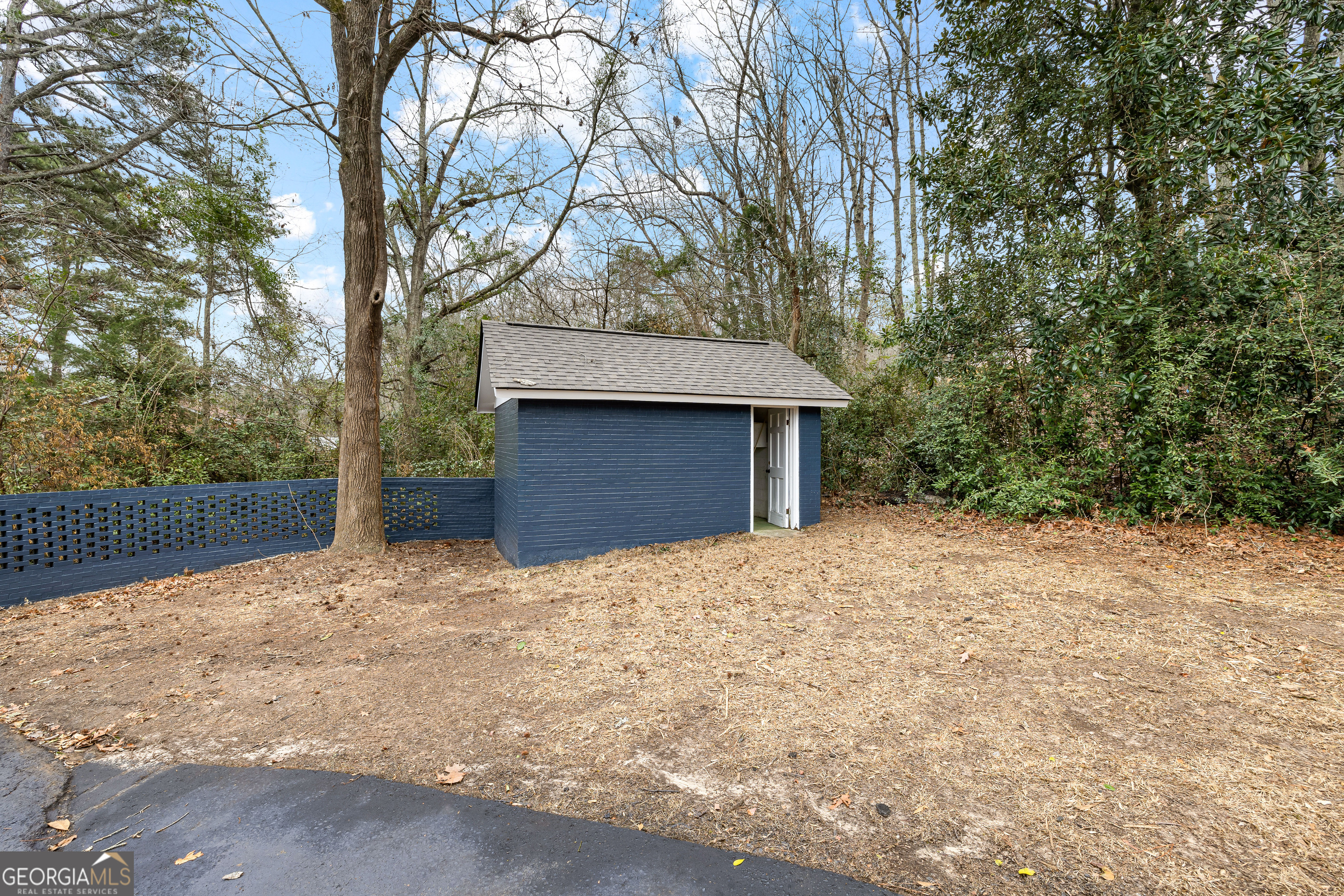 617 Mayes Way Manchester, GA 31816 - Photo 30 of 34 a house with trees in front of it