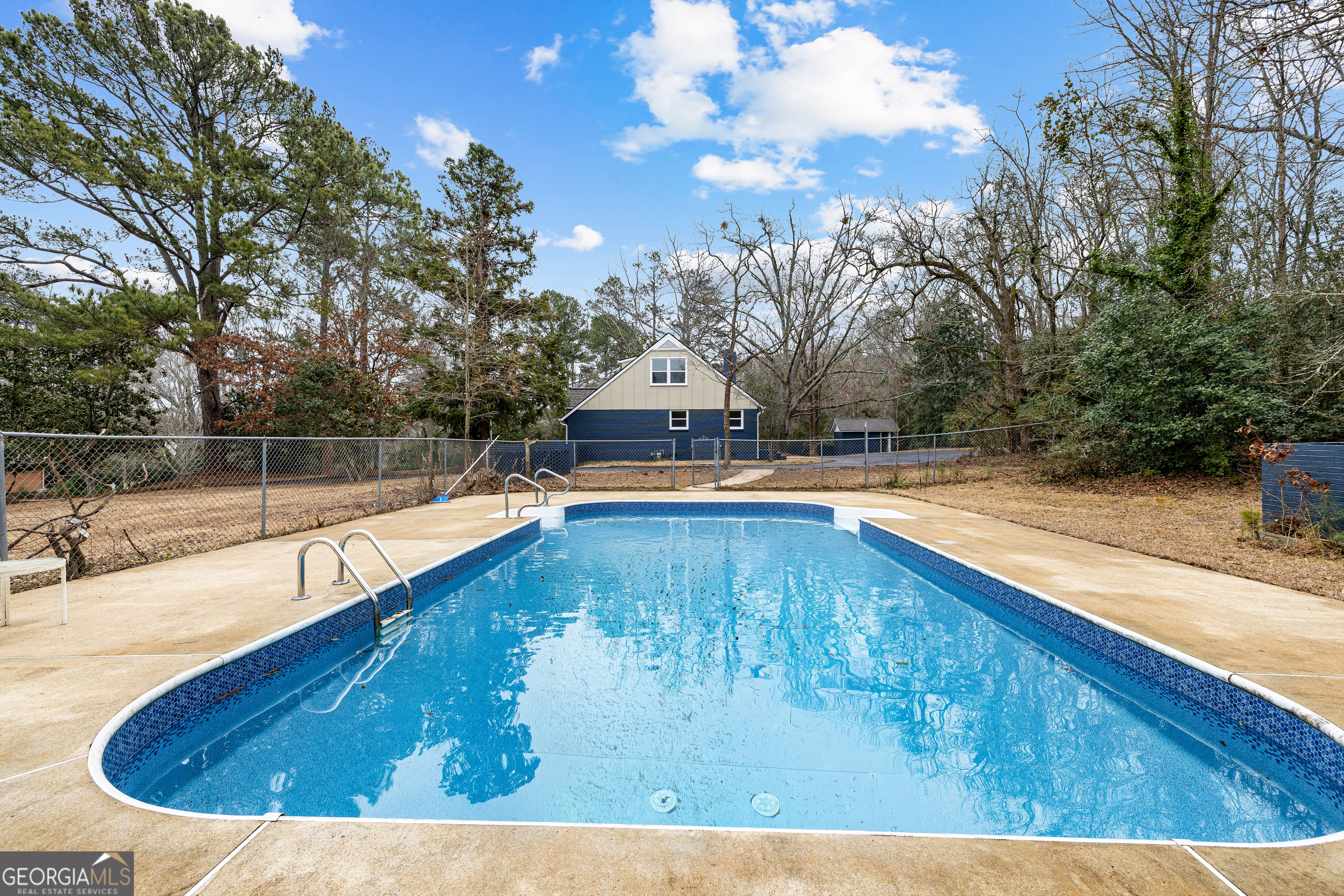 617 Mayes Way Manchester, GA 31816 - Photo 33 of 34 a view of a swimming pool with an outdoor seating