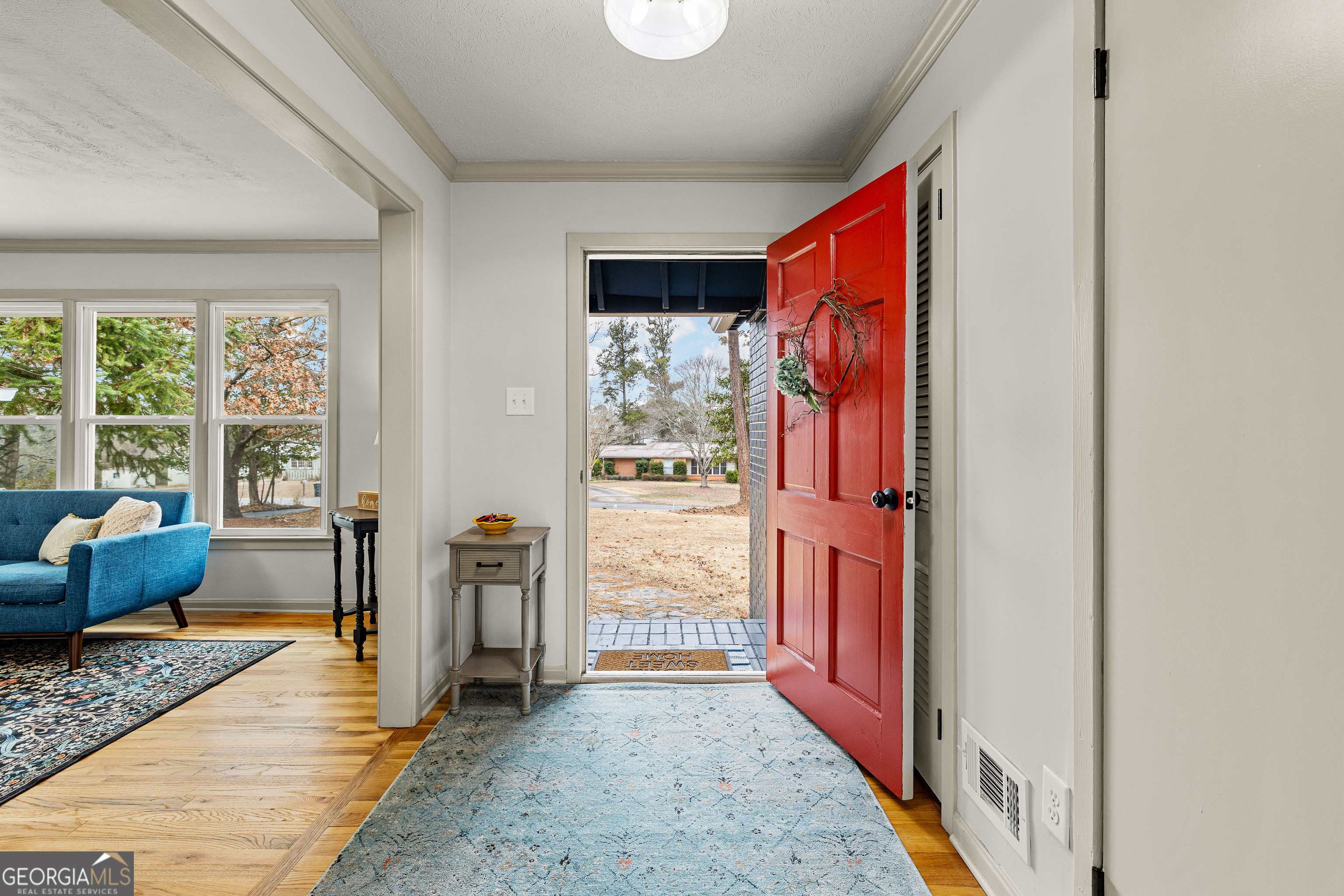 617 Mayes Way Manchester, GA 31816 - Photo 4 of 34 a view of a hallway with furniture and windows