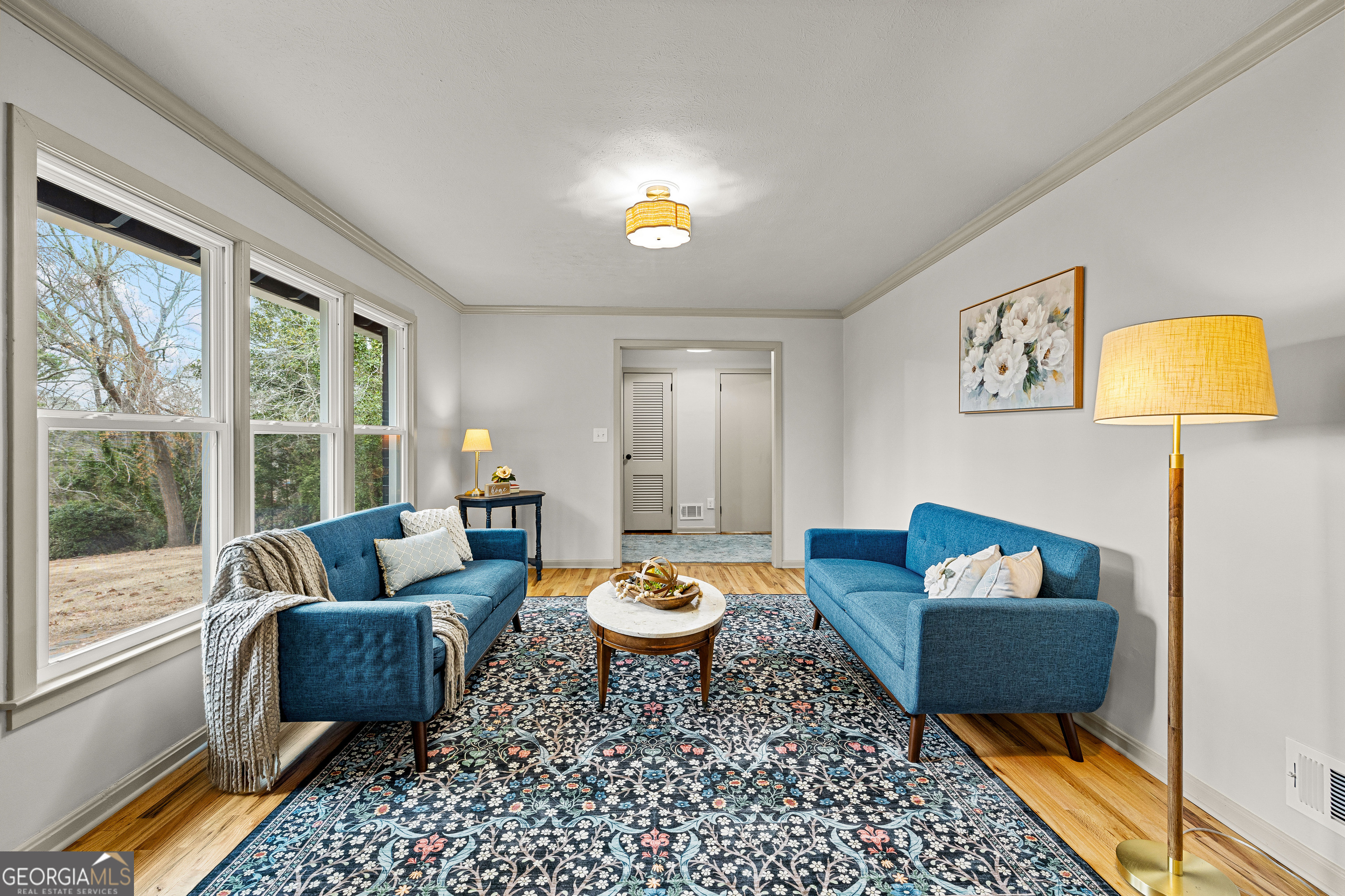 617 Mayes Way Manchester, GA 31816 - Photo 8 of 34 a living room with furniture and a lamp
