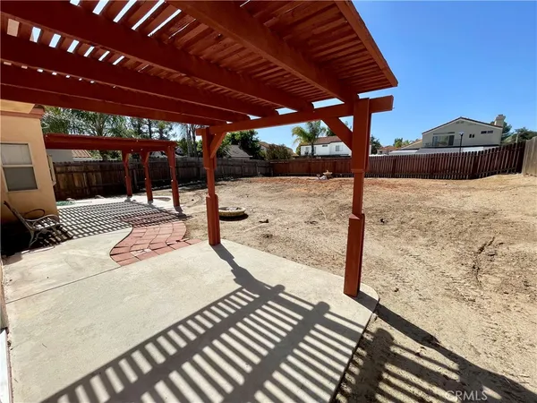 a view of a house with wooden roof
