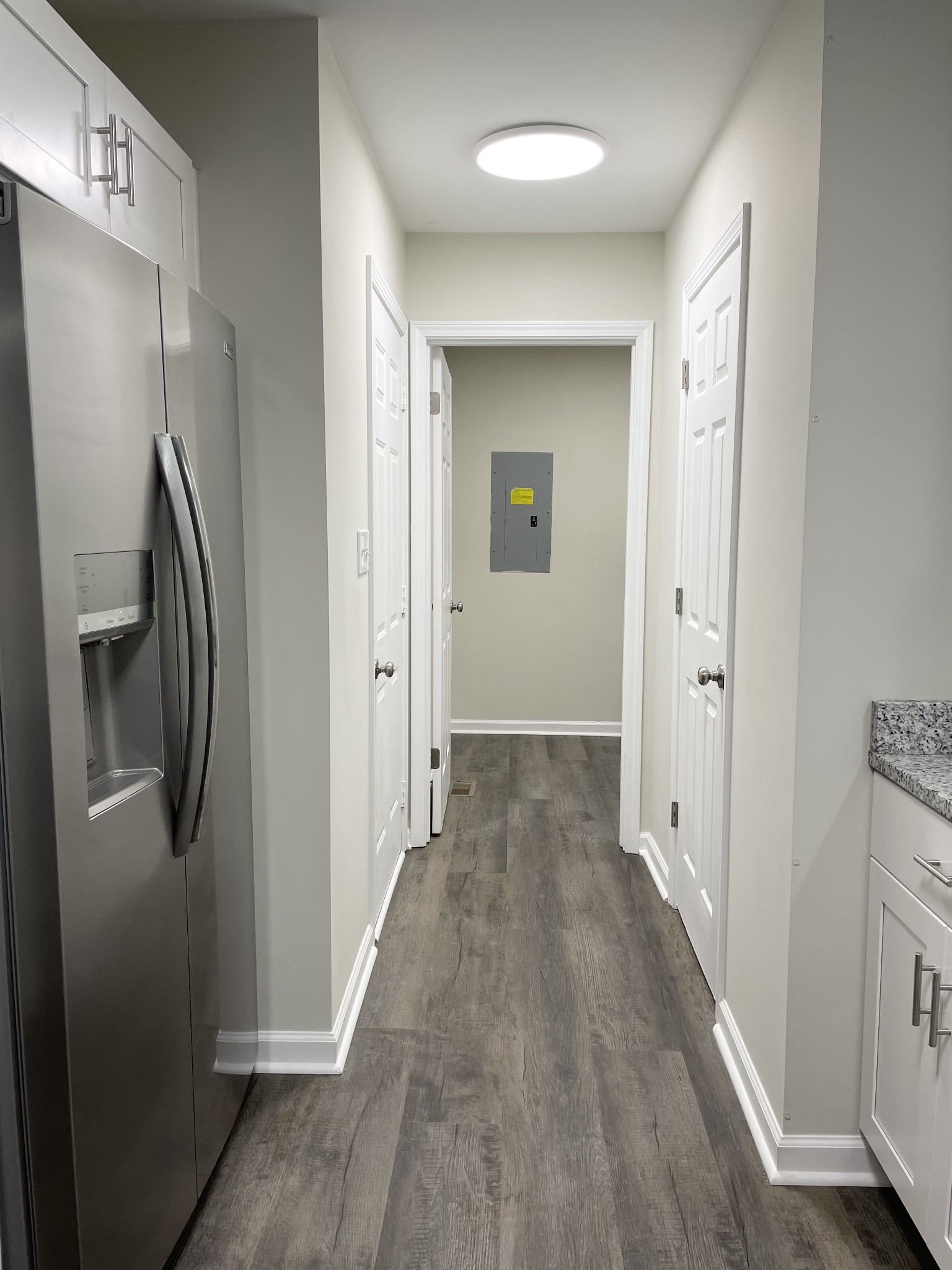 3060 Lylewood Road Woodlawn, TN 37191 - Photo 11 of 56 a view of a hallway with wooden floor