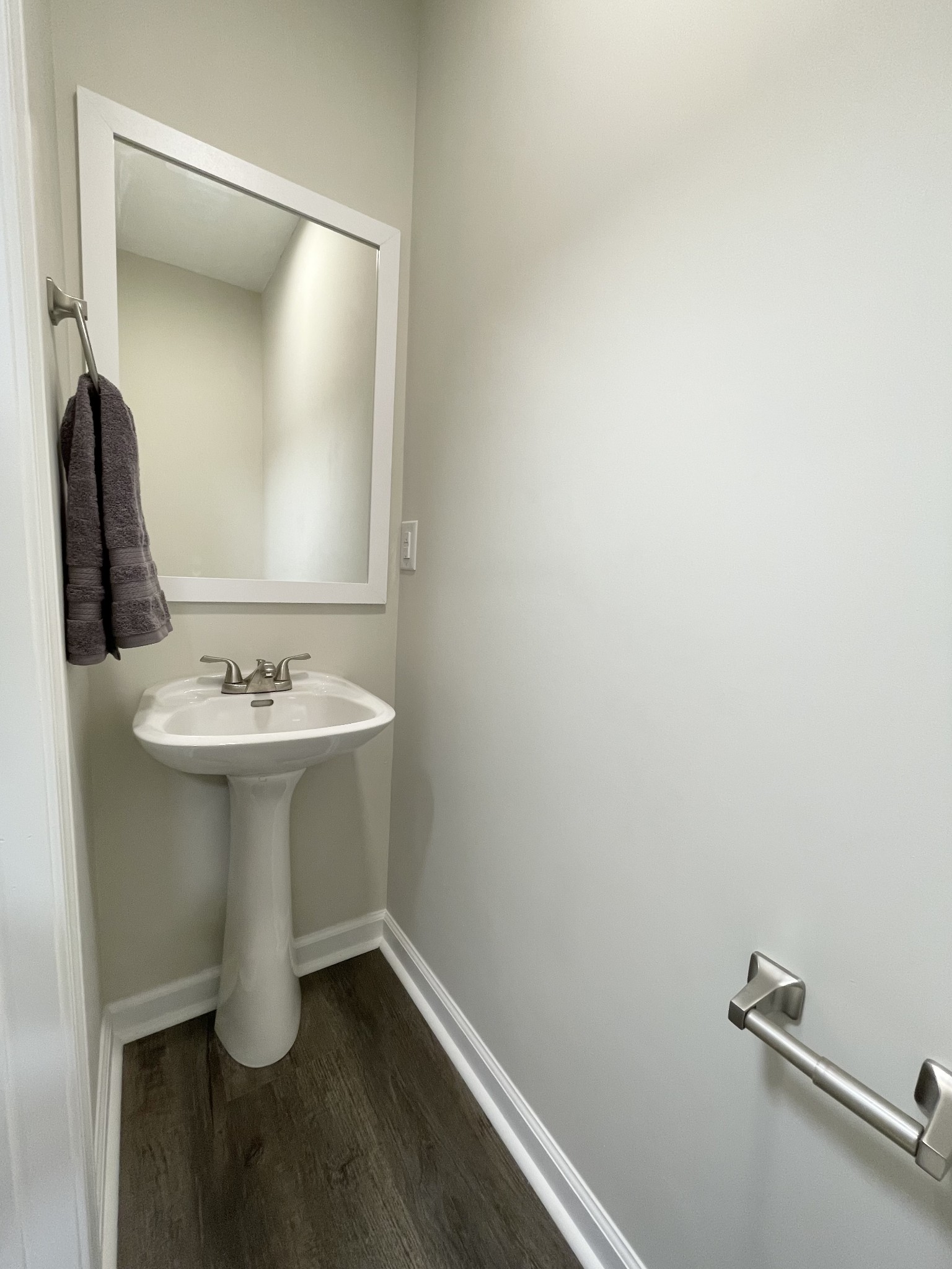 3060 Lylewood Road Woodlawn, TN 37191 - Photo 12 of 56 a bathroom with a sink and mirror