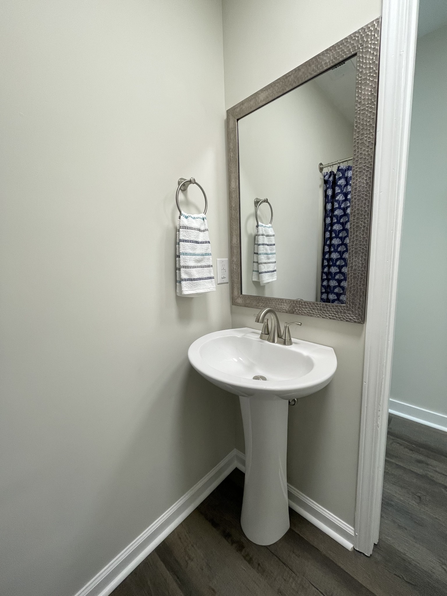 3060 Lylewood Road Woodlawn, TN 37191 - Photo 20 of 56 a bathroom with a sink a mirror and a vanity