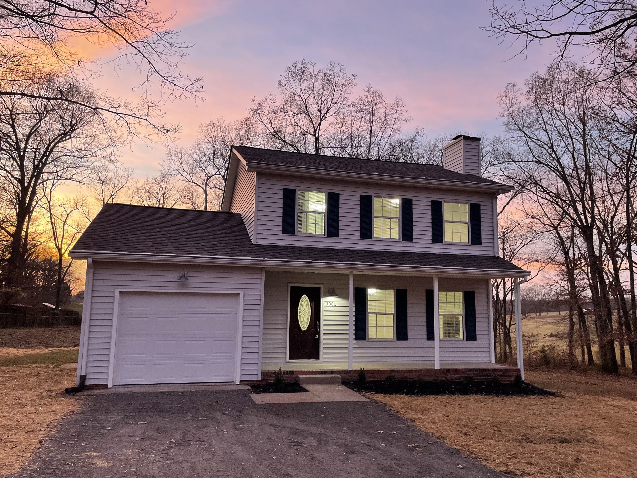 3060 Lylewood Road Woodlawn, TN 37191 - Photo 2 of 56 a front view of a house