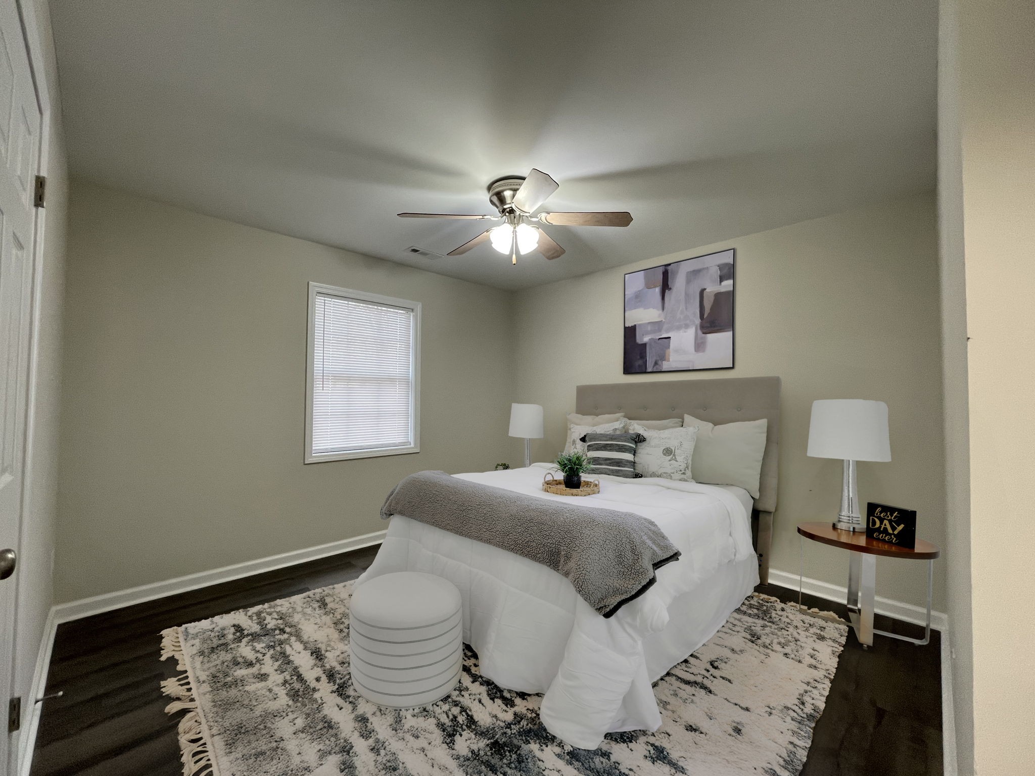 3060 Lylewood Road Woodlawn, TN 37191 - Photo 23 of 56 a bedroom with a bed and a painting on the wall