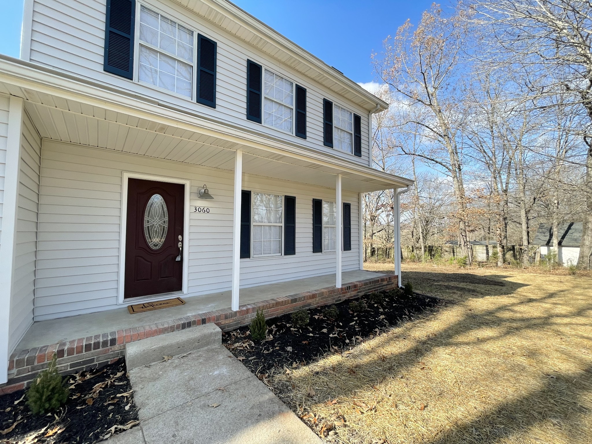 3060 Lylewood Road Woodlawn, TN 37191 - Photo 3 of 56 a front view of a house