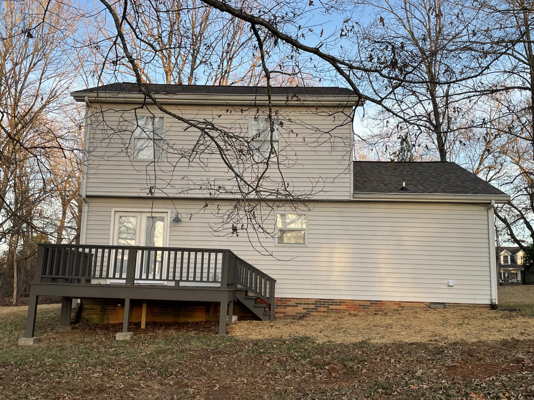 3060 Lylewood Road Woodlawn, TN 37191 - Photo 45 of 56 a view of a house with a yard and deck