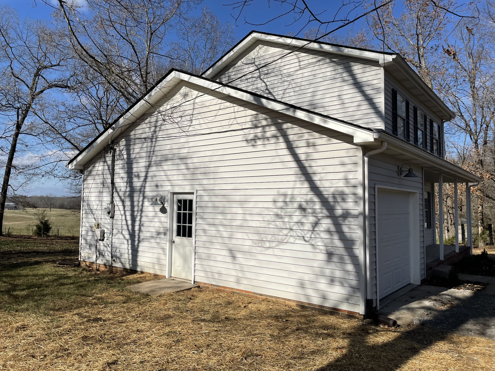 3060 Lylewood Road Woodlawn, TN 37191 - Photo 50 of 56 a view of a house with a door