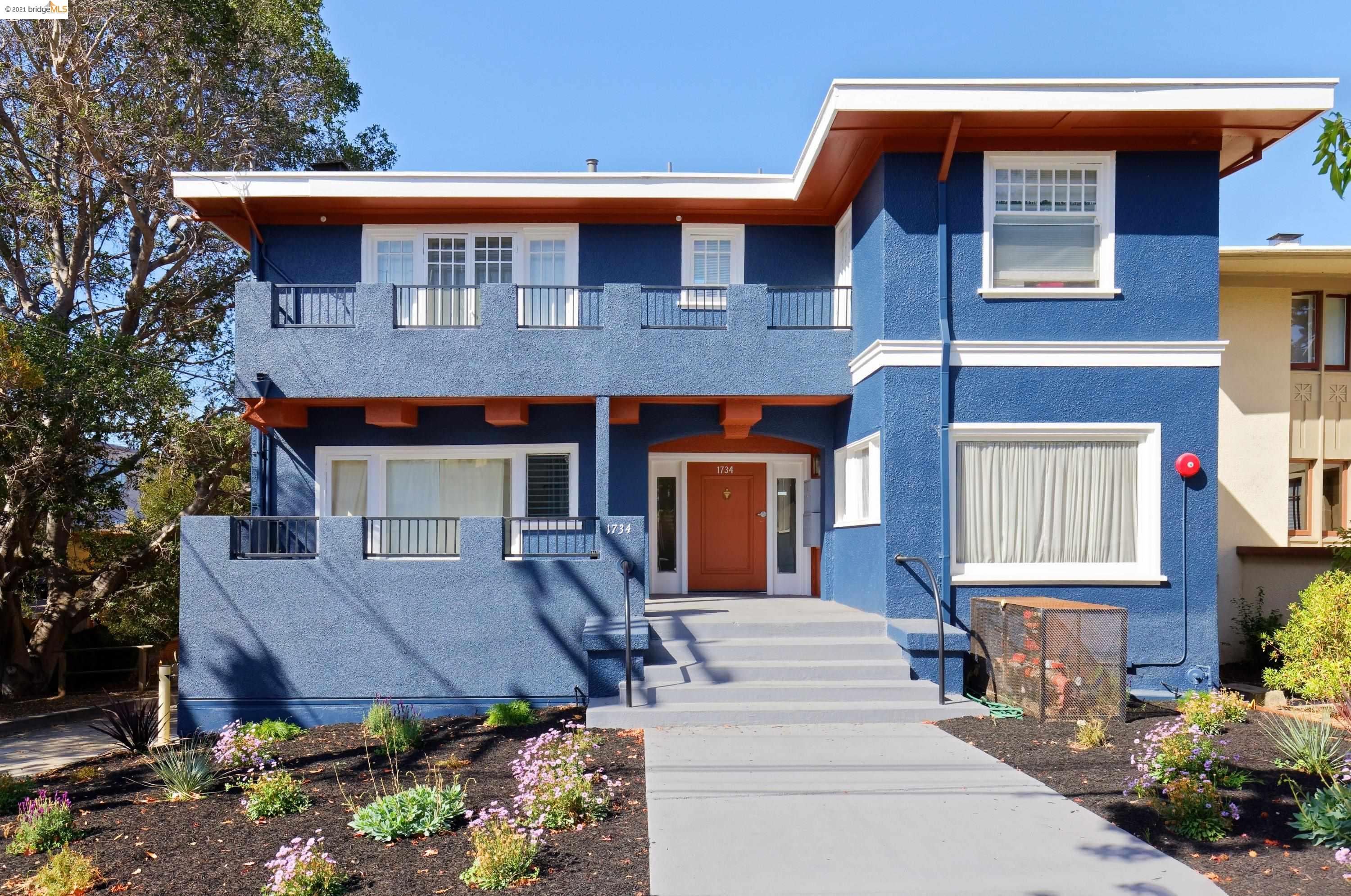 1734 Spruce Street Berkeley, CA 94709 - Photo 1 of 1 a front view of a house with a yard