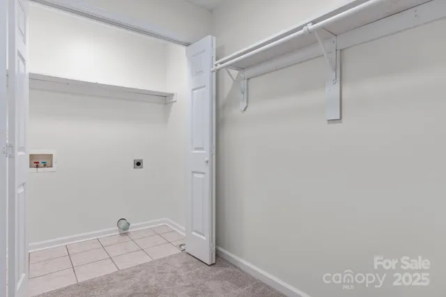 a view of an empty walk in closet