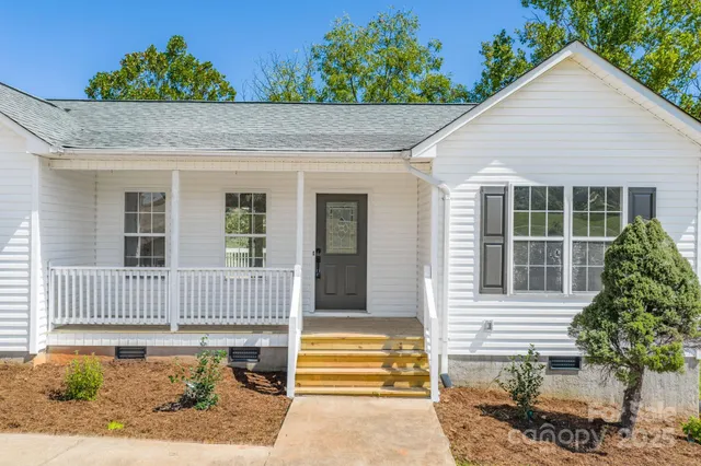 a front view of a house having yard