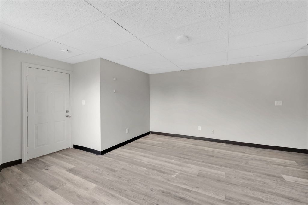 192-198 White Street Springfield, MA 01108 - Photo 23 of 29 a view of an empty room and wooden floor