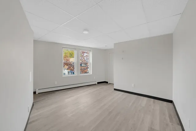 an empty room with windows