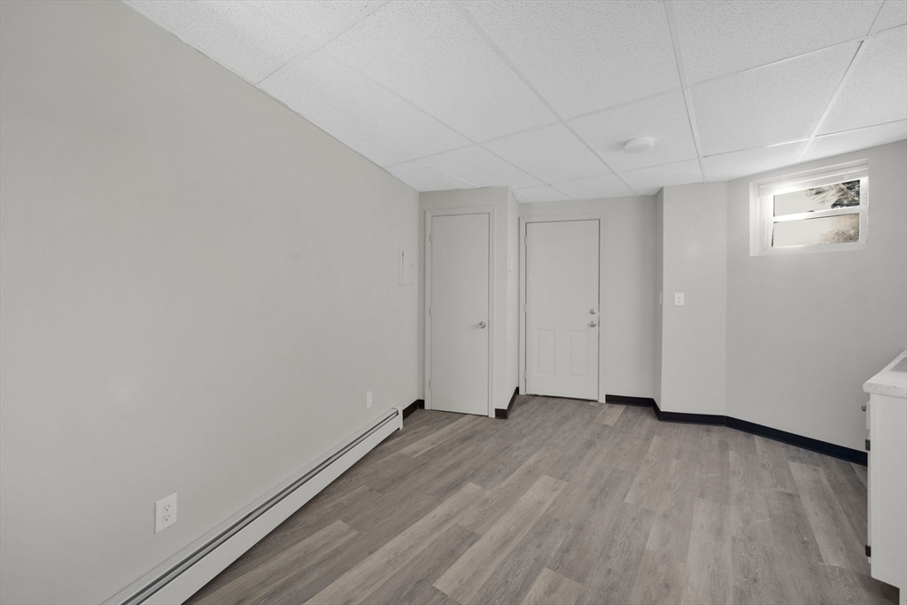 192-198 White Street Springfield, MA 01108 - Photo 27 of 29 a view of a room with wooden floor