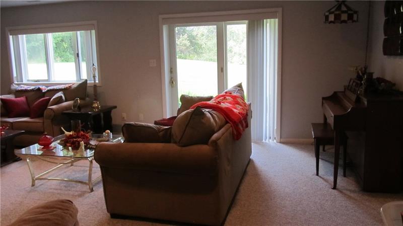 202 Center Church Road Grove City, PA 16127 - Photo 14 of 25 Lower level family room has sliding glass door to outside
