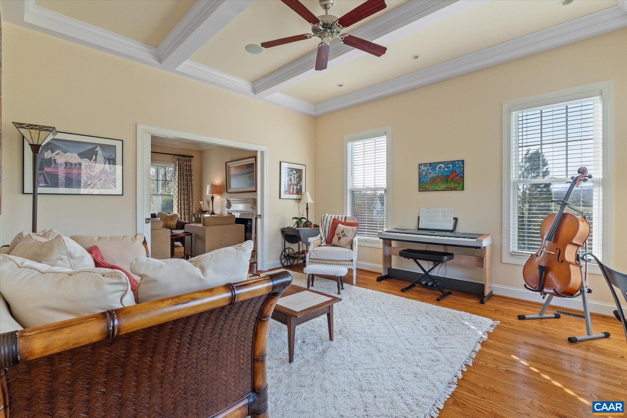 3150 Rocks Farm Court Charlottesville, VA 22903 - Photo 17 of 74 a living room with furniture a rug and a window